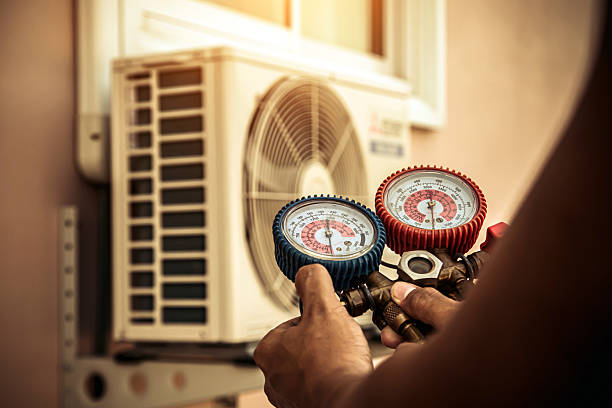 Professional Air Conditioning Service technician working in Freedom, OK